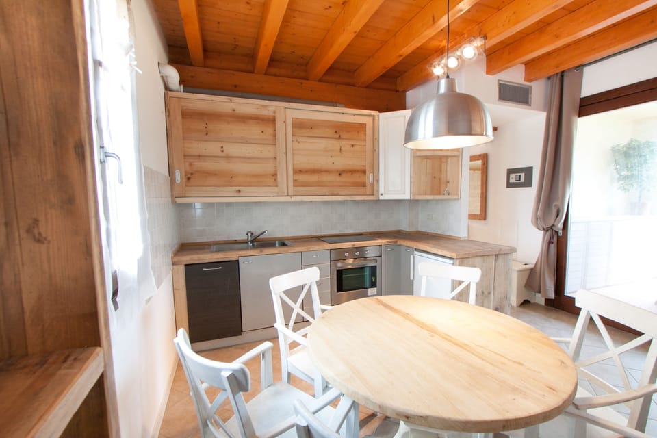 Comfort Apartment, 1 Bedroom, Pool View, Ground Floor | Private kitchen | Full-size fridge, oven, stovetop, dishwasher