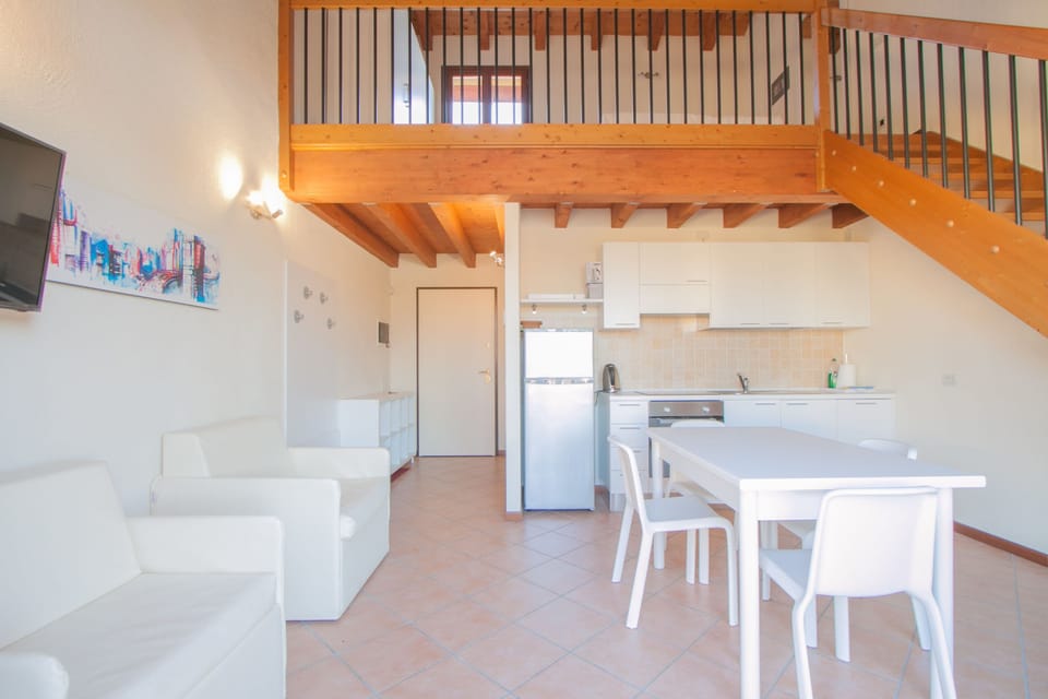 Deluxe Studio, Terrace, Pool View | Down comforters, individually decorated, individually furnished