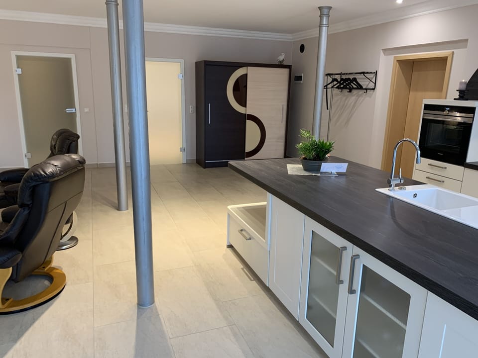 Comfort Suite, 2 Queen Beds, Non Smoking, Courtyard View | Living area | 55-inch flat-screen TV with satellite channels, TV, iPod dock