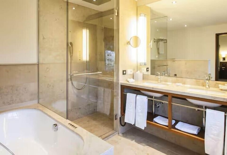 Duplex, 1 King Bed, Lake View | Bathroom | Eco-friendly toiletries, hair dryer, bathrobes, slippers