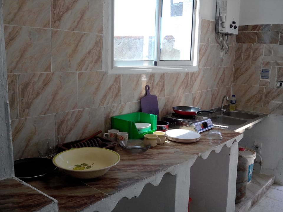 Family Penthouse, Courtyard View | Private kitchen | Fridge, microwave, stovetop, electric kettle