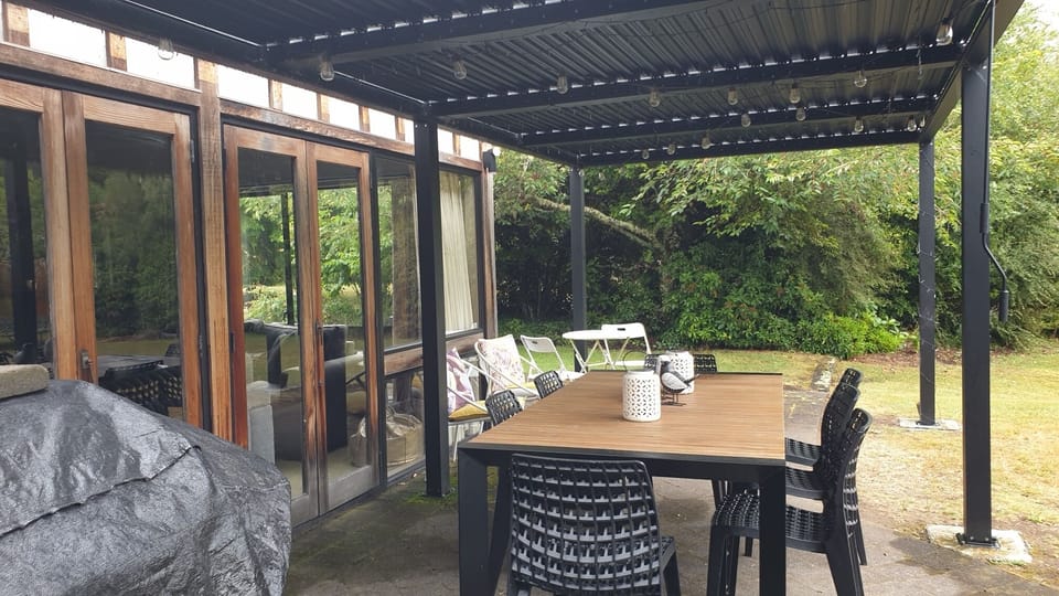 Aluminium Pergola. adjustable, hand-cranked louvres  .Shut rain out or sunshine.