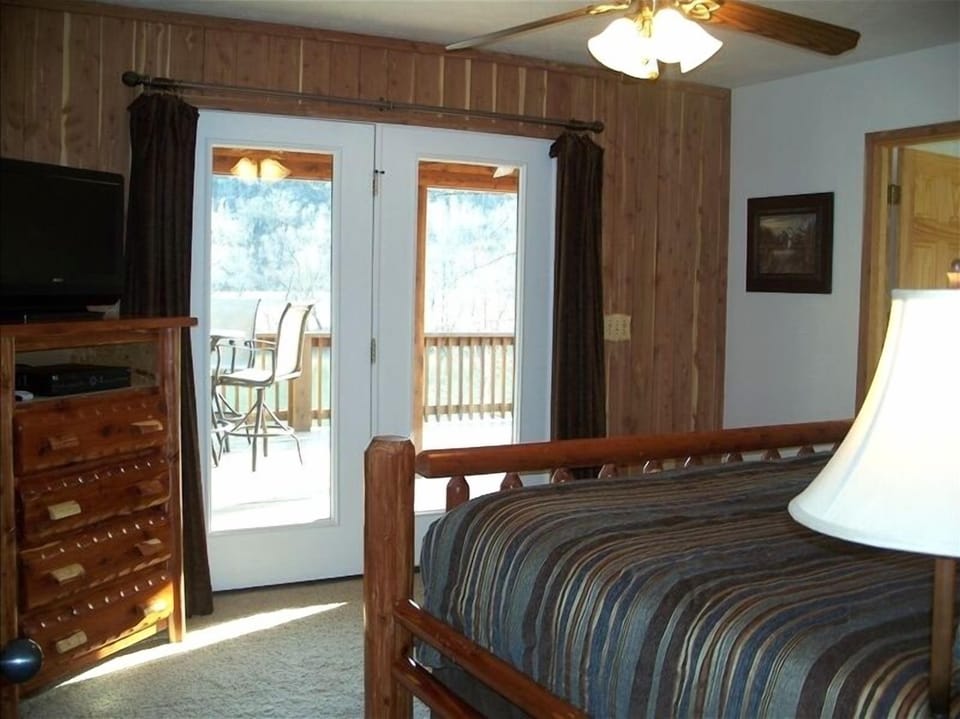 Master bedroom with King bed, full bath and private walk out to back deck