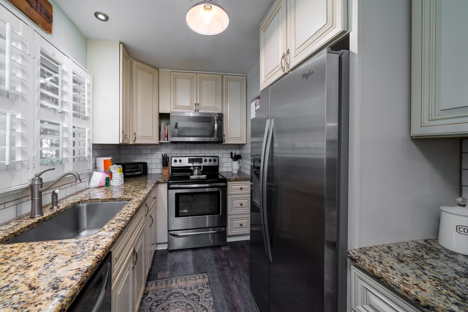 Completely renovated kitchen with stainless appliances.  A cook's delight!