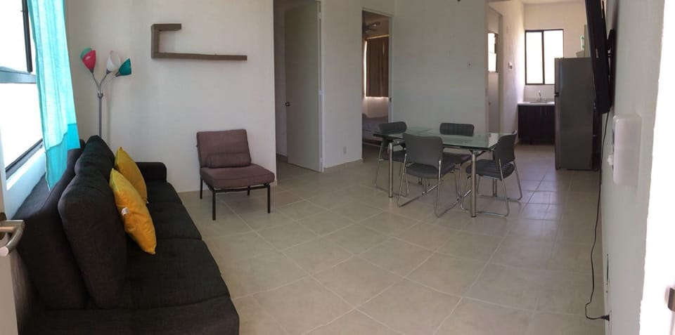 Deluxe Apartment, 2 Bedrooms | Living area | Flat-screen TV
