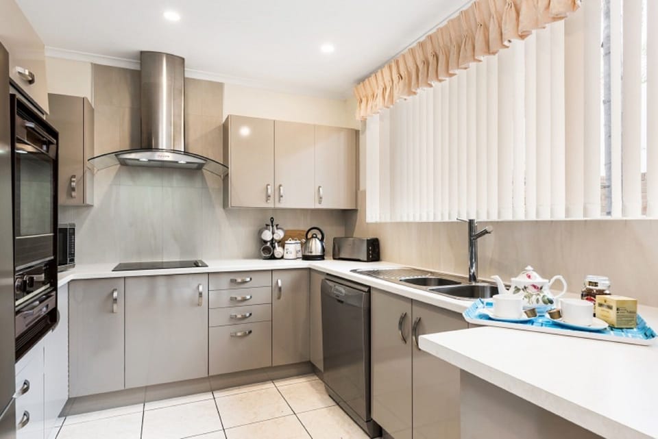 Bright open kitchen with all modern facilities to enjoy your stay.  
