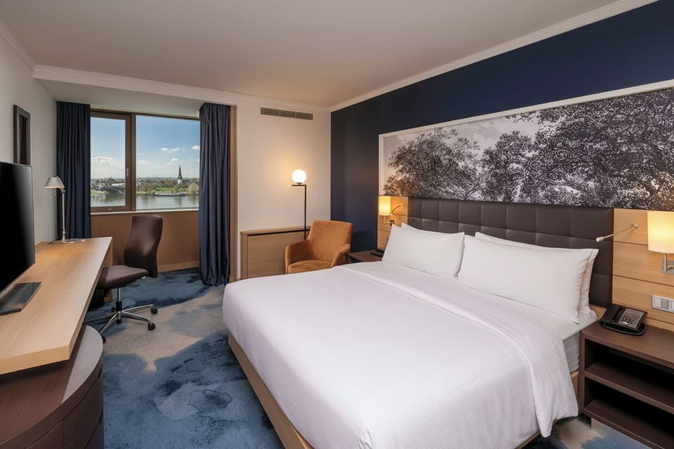 Premium bedding, down comforters, minibar, in-room safe