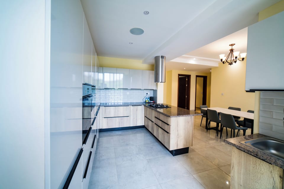 Family Apartment | Private kitchenette | Coffee/tea maker, eco-friendly cleaning products