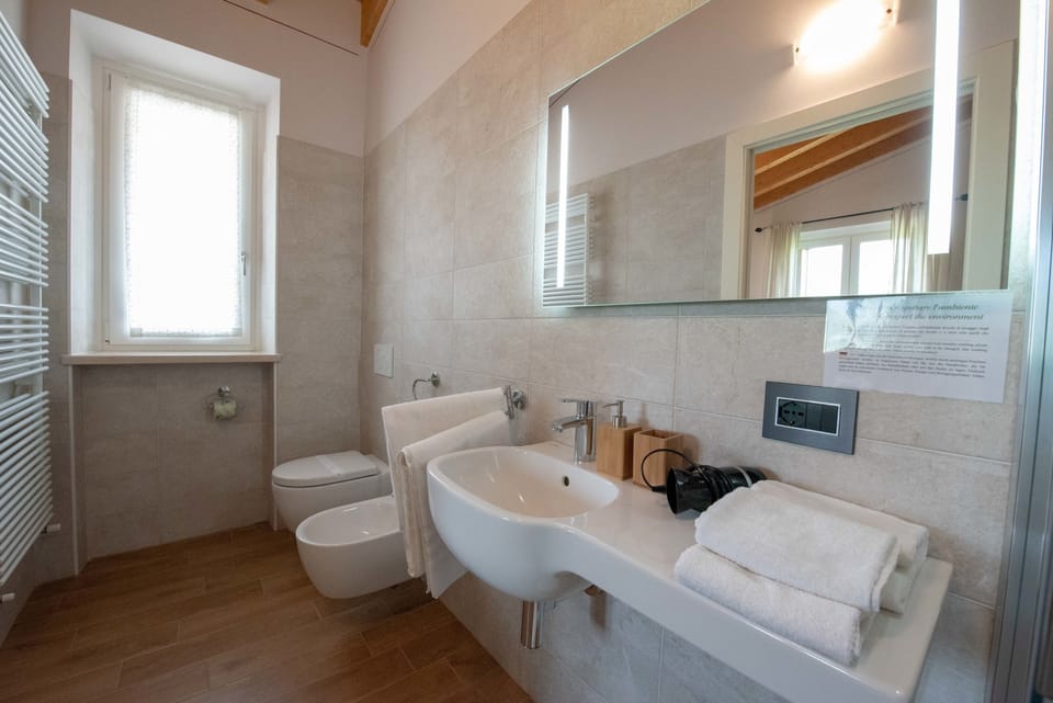 Shower, rainfall showerhead, eco-friendly toiletries, hair dryer