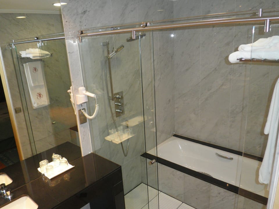 Shower, free toiletries, hair dryer, towels