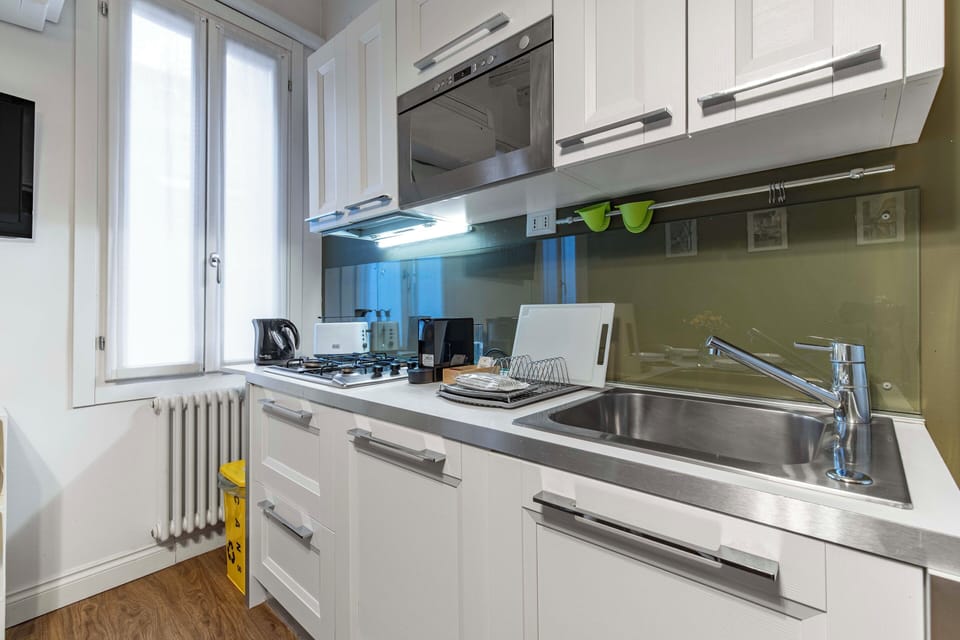 Apartment, 2 Bedrooms | Private kitchen | Fridge, microwave, stovetop, dishwasher