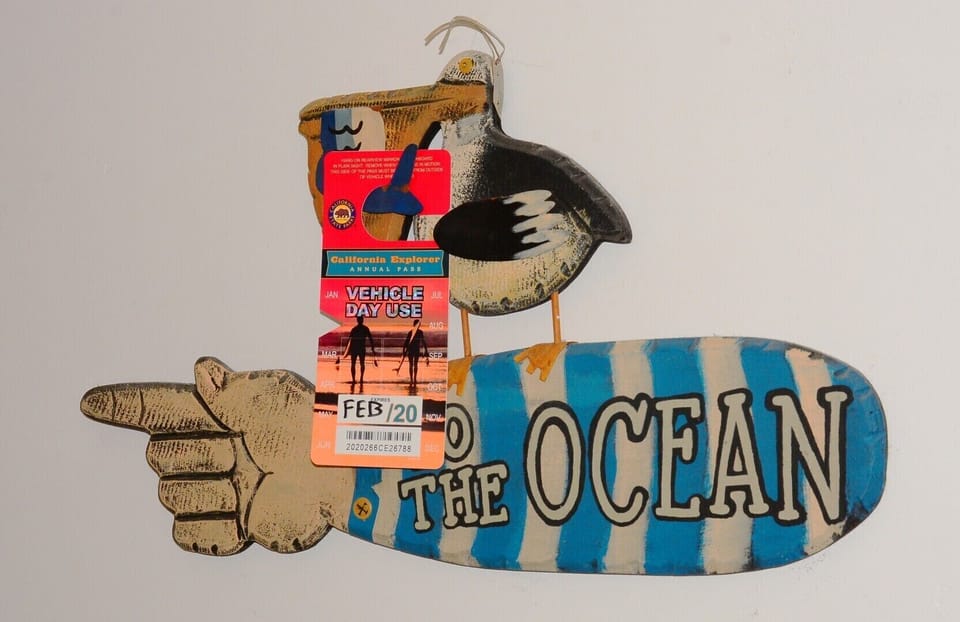 Beach Parking Pass hanging in laundry area, please put back before check out