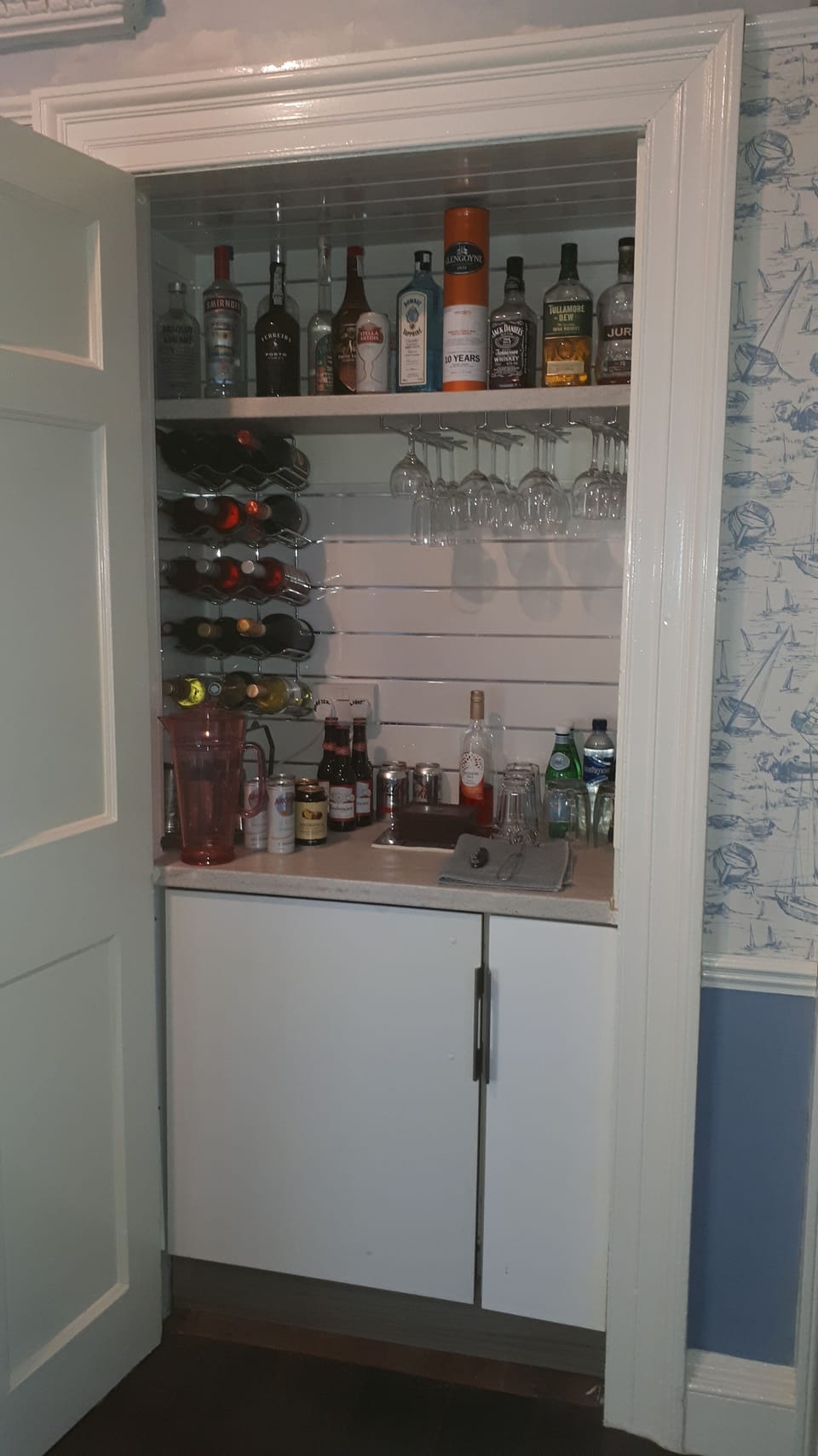Stocked bar with honesty box