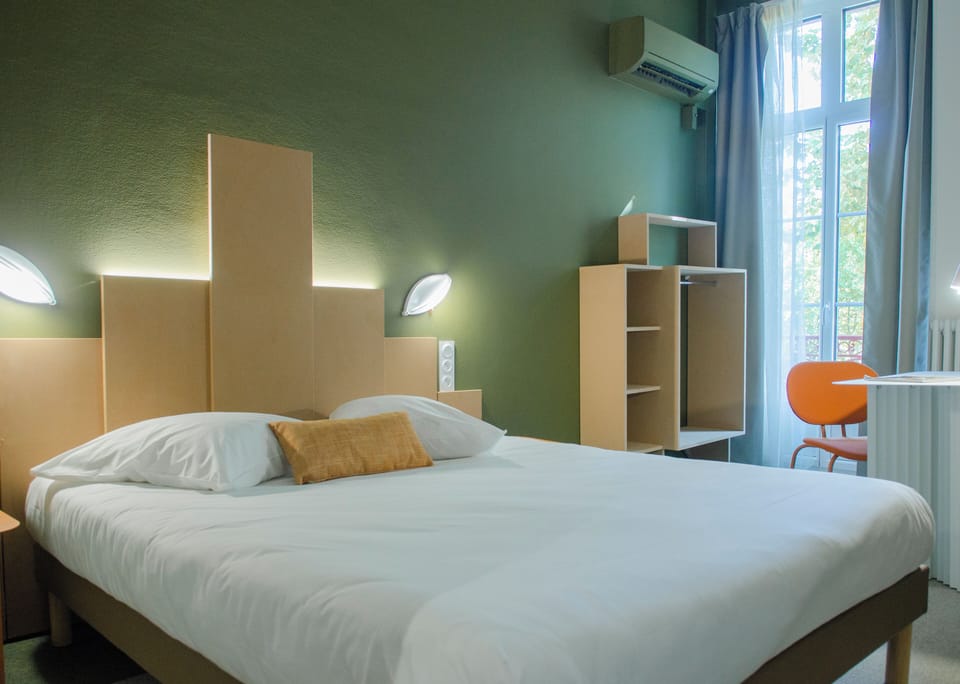 Premium bedding, individually furnished, laptop workspace