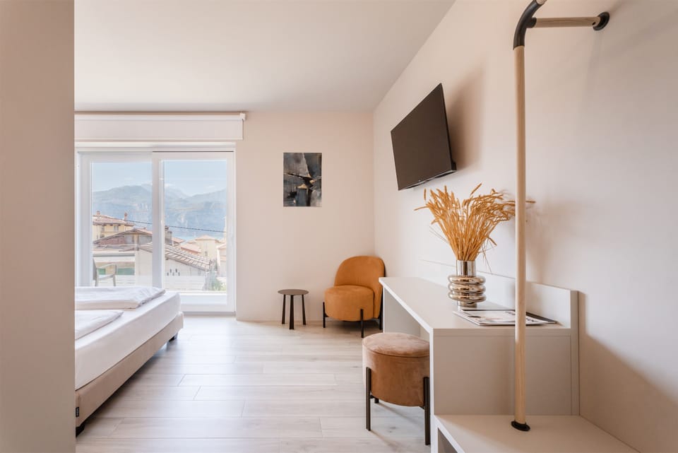 Premier Room, Balcony | Living area | TV