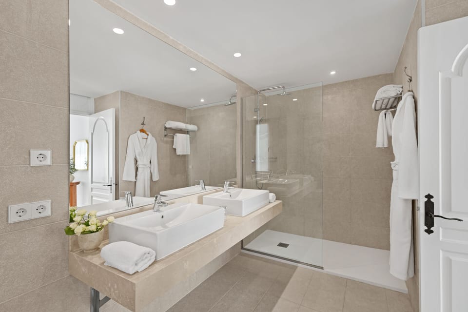 Suite, Terrace, Pool View | Bathroom | Free toiletries, hair dryer, bathrobes, slippers