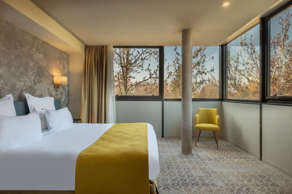 Junior Suite, 1 Double Bed | Minibar, in-room safe, individually decorated, individually furnished