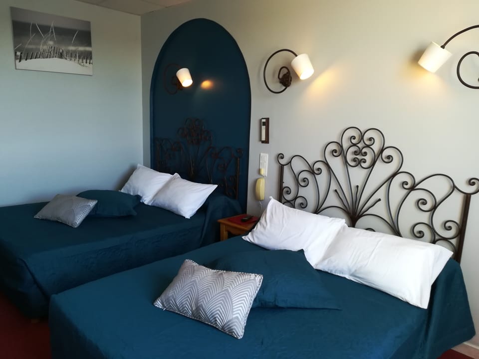 Quadruple Room | Pillowtop beds, in-room safe, individually decorated