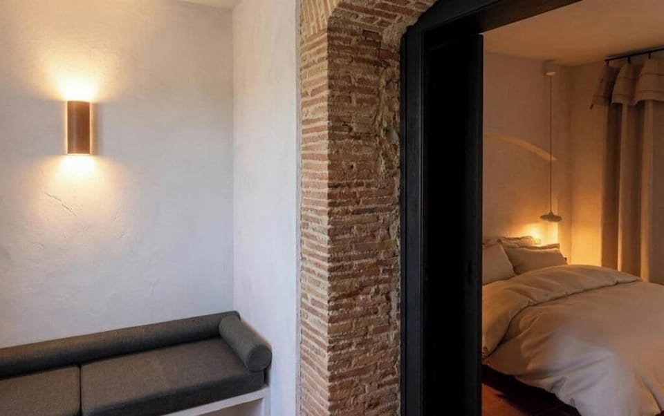 Deluxe Room with Terrace | Minibar, in-room safe, desk, soundproofing