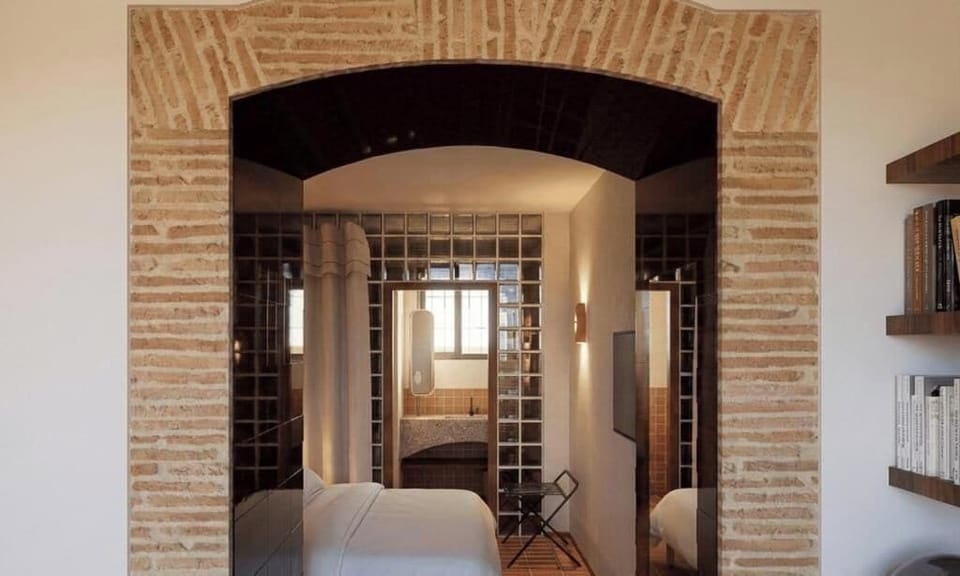 Deluxe Room with Terrace | Minibar, in-room safe, desk, soundproofing