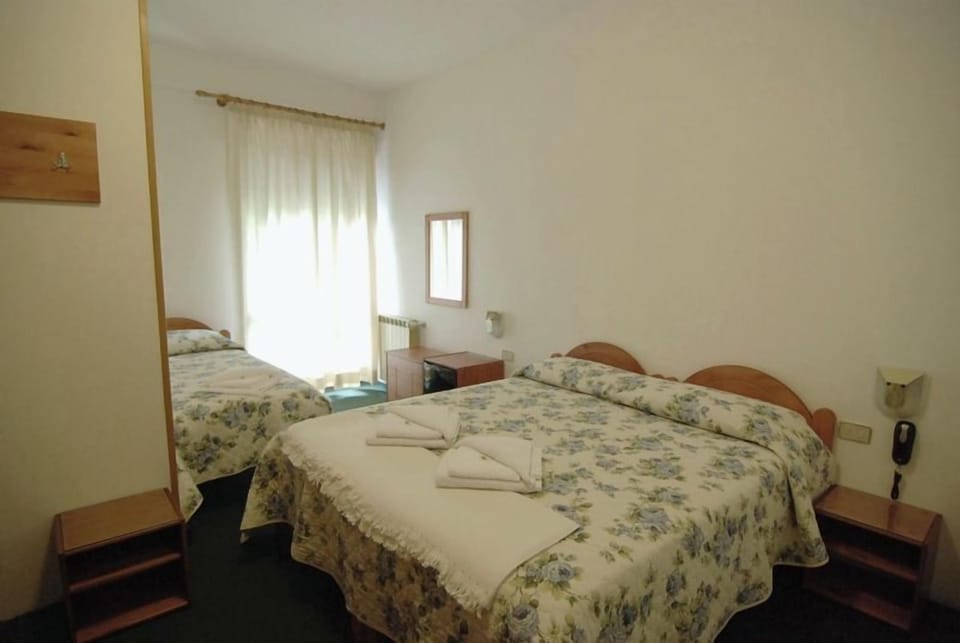 Triple Room | Down comforters, minibar, in-room safe, desk