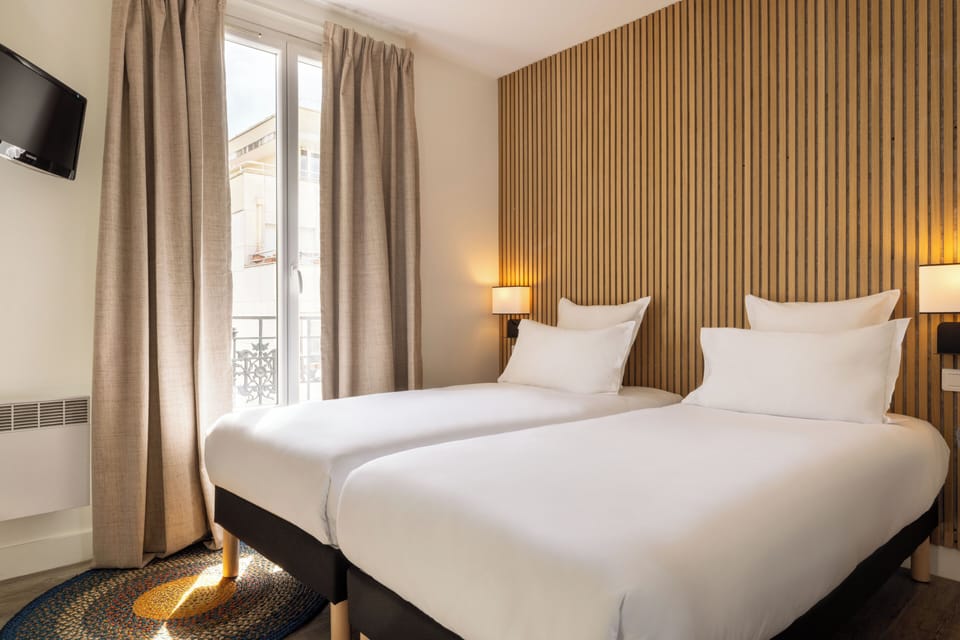 Twin Room | Desk, blackout drapes, soundproofing, iron/ironing board