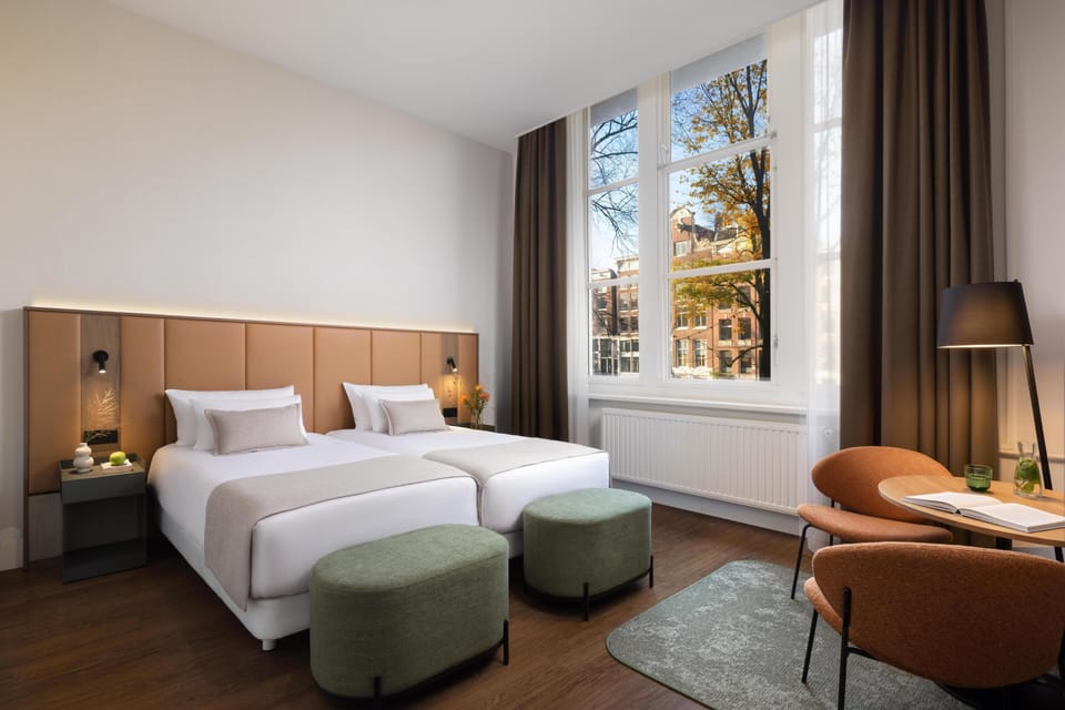 Superior Room, City View | Minibar, in-room safe, desk, blackout drapes