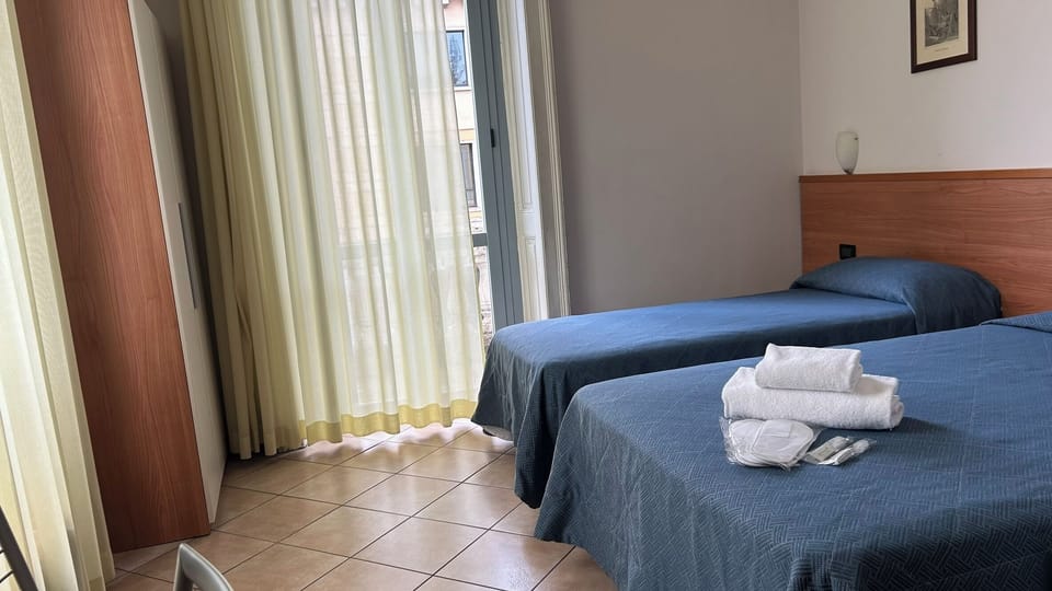 Standard Room, 2 Twin Beds | In-room safe, desk, free WiFi, bed sheets