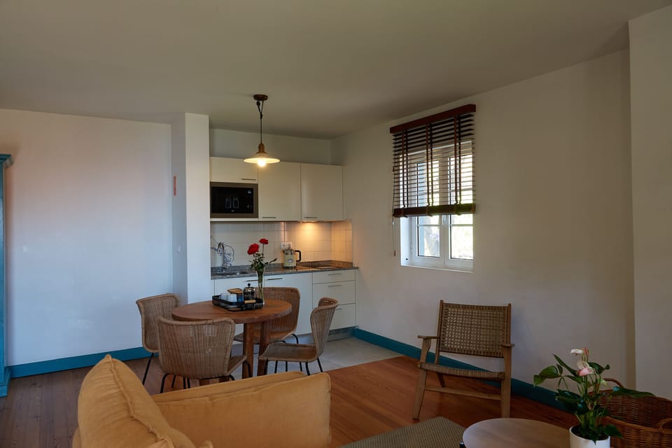 Apartment | Private kitchen | Fridge, microwave, stovetop, cookware/dishes/utensils
