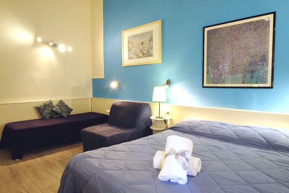 Family Room | Memory foam beds, in-room safe, desk, blackout drapes