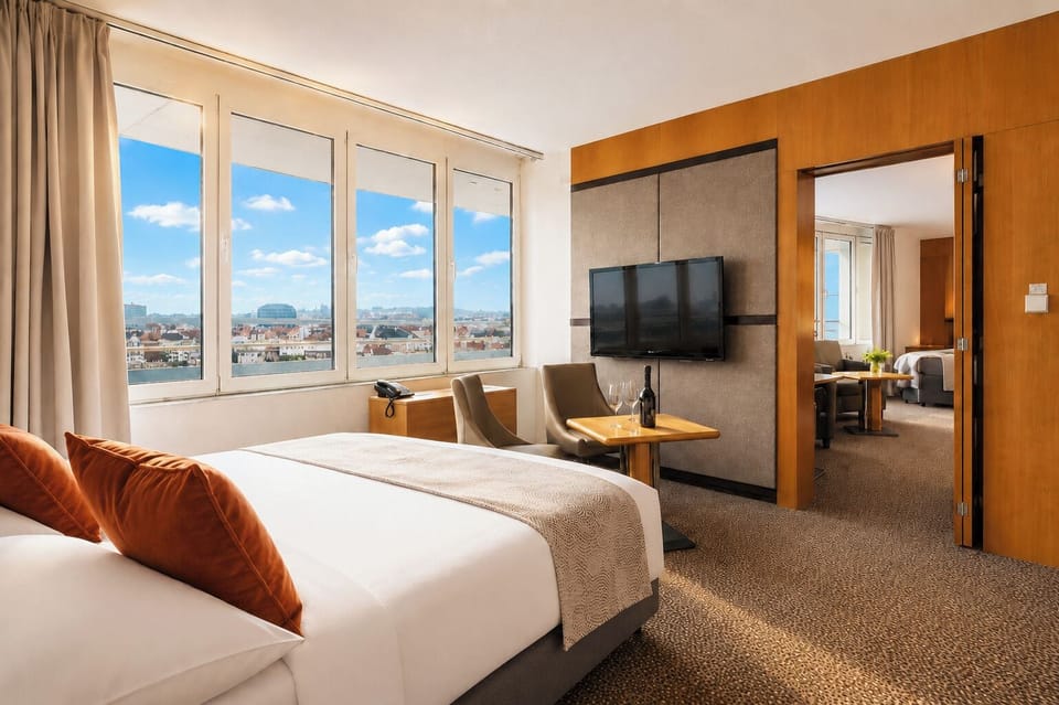Presidential Quadruple Room | Minibar, in-room safe, desk, laptop workspace
