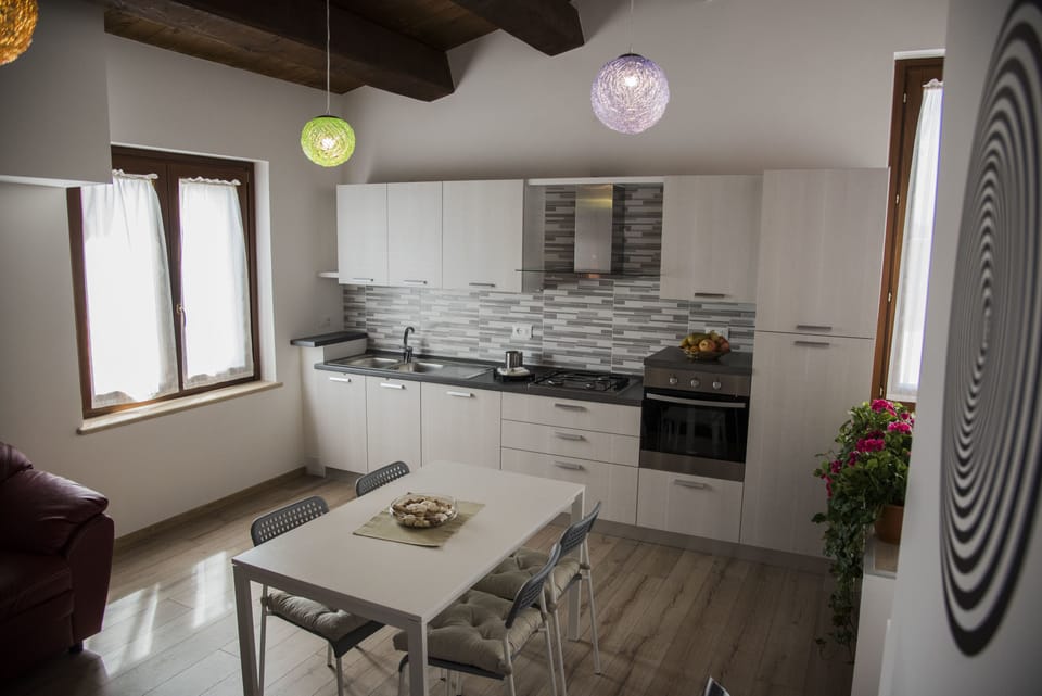 Deluxe Apartment (La Veduta) | Private kitchen | Fridge, oven, stovetop, electric kettle