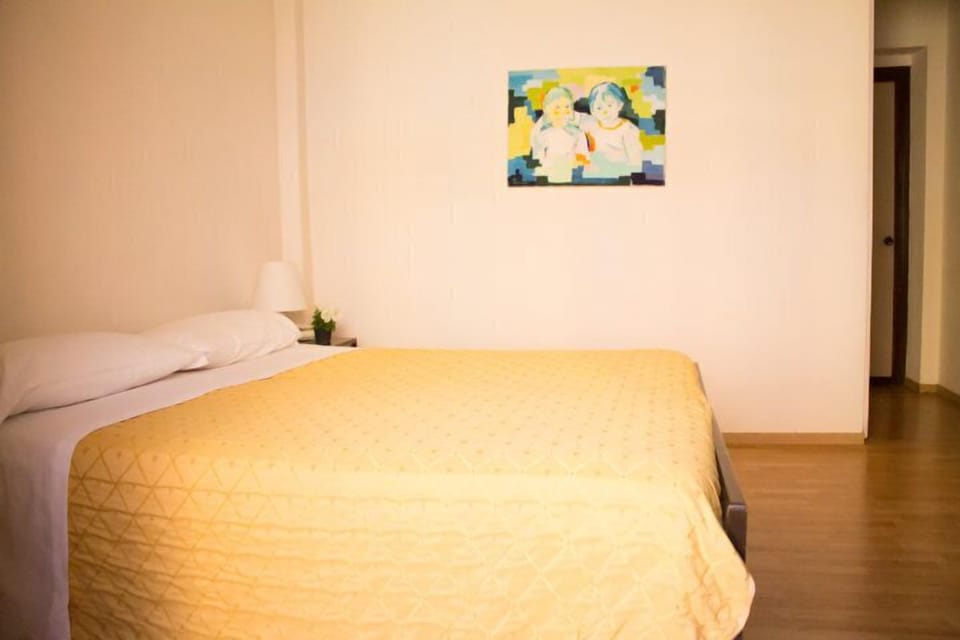 Double Room | Minibar, in-room safe, iron/ironing board, free cribs/infant beds