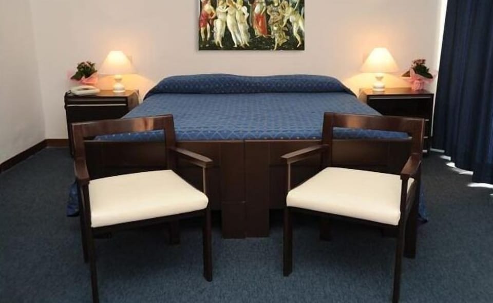 Single Room | Minibar, in-room safe, iron/ironing board, free cribs/infant beds