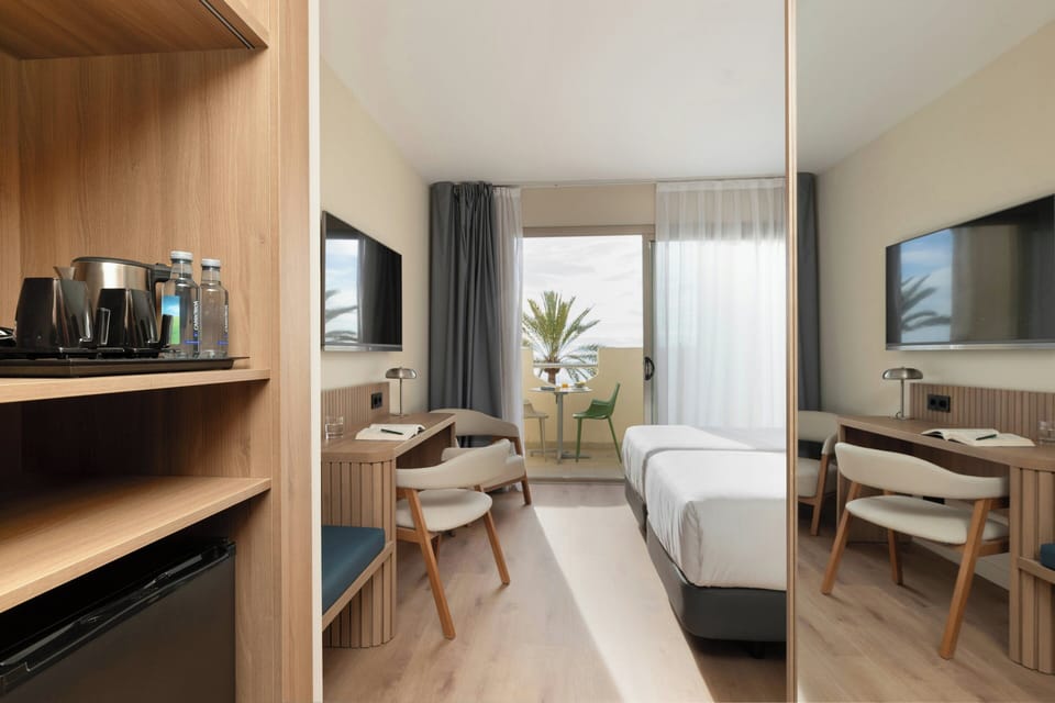 Superior Twin Room, Balcony, Sea View | Minibar, in-room safe, desk, soundproofing