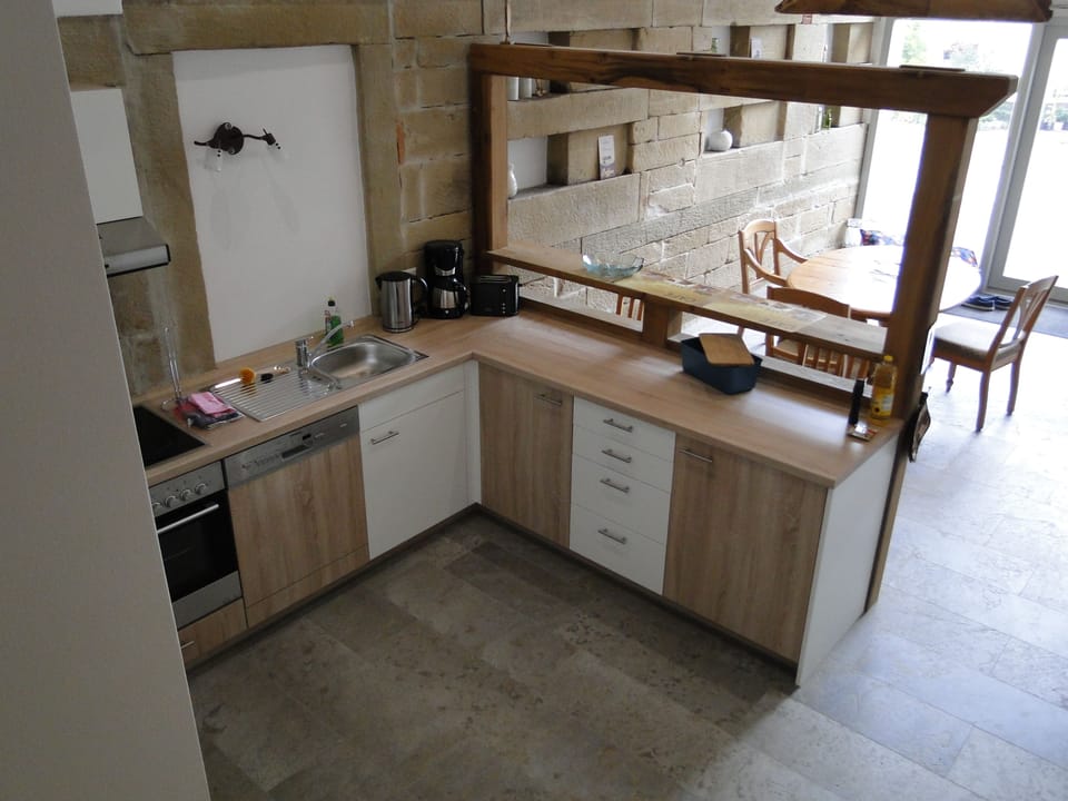 Apartment, 3 Bedrooms | Private kitchen | Full-size fridge, microwave, oven, stovetop