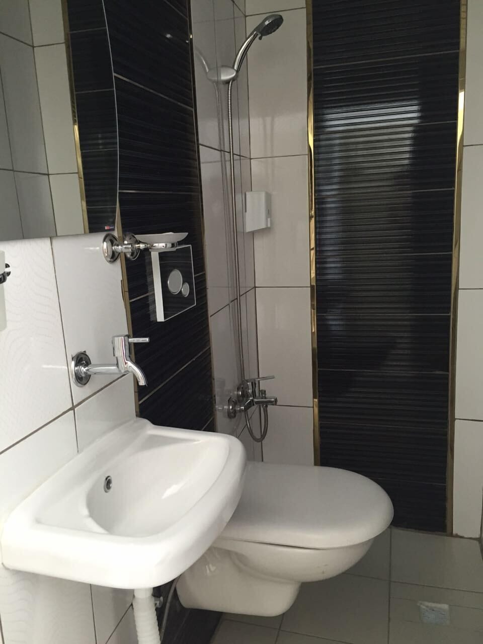 Shower, free toiletries, hair dryer, slippers