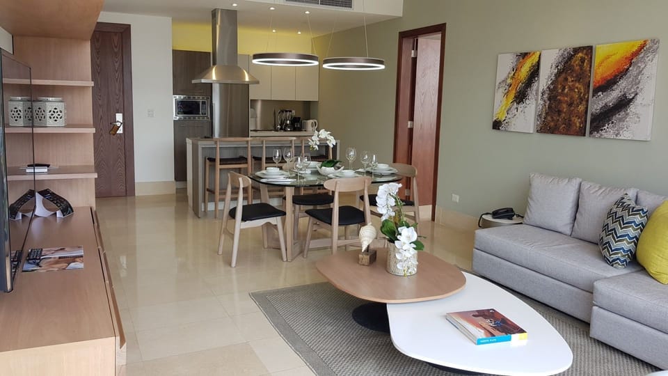 Condo, 1 Bedroom (All Inclusive) | Living area | Flat-screen TV