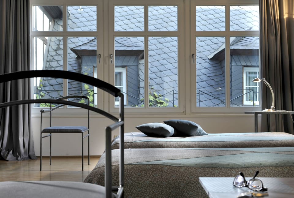 Double Room | Minibar, in-room safe, individually decorated, individually furnished