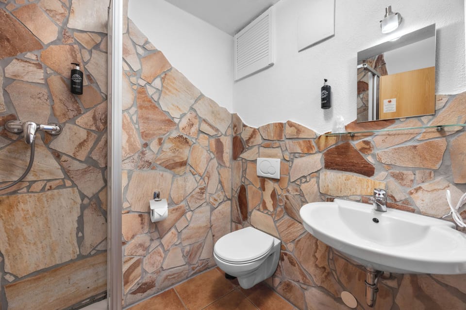 Quadruple Room | Bathroom | Shower, deep soaking tub, hair dryer, towels