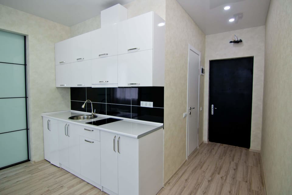 Family Quadruple Room, 1 Bedroom | Private kitchen | Fridge, microwave, stovetop, cookware/dishes/utensils
