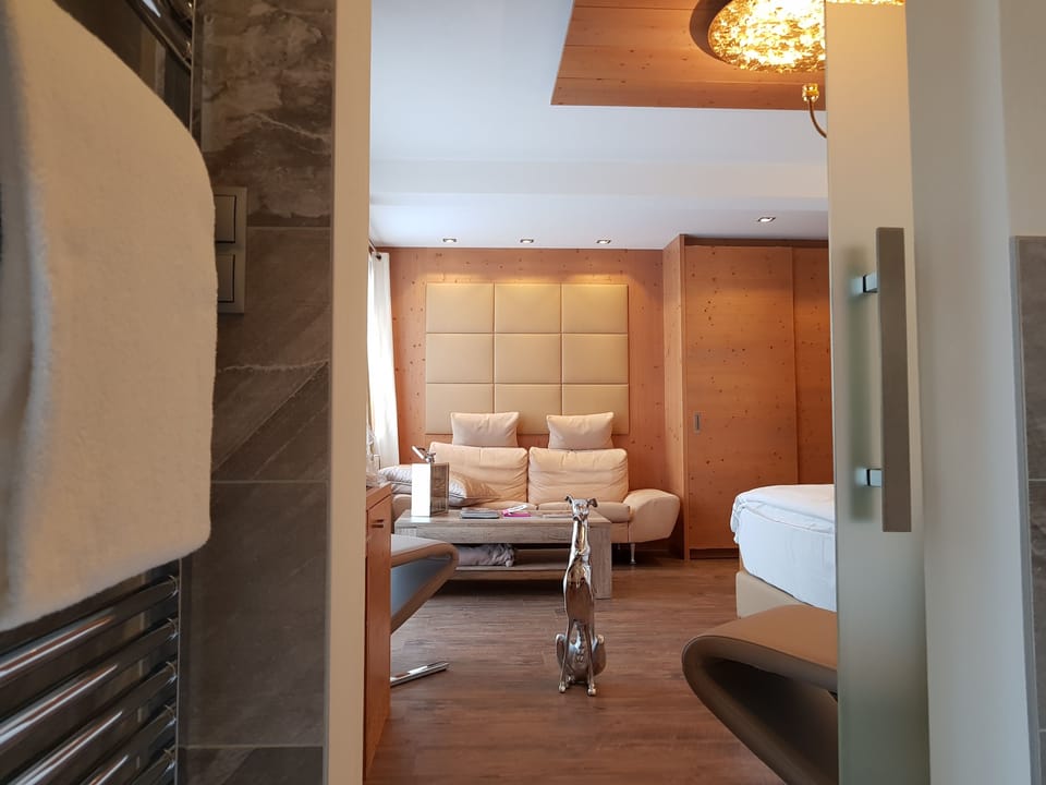 Junior Suite, Balcony (Deluxe) | Living area | 50-inch LED TV with cable channels, TV