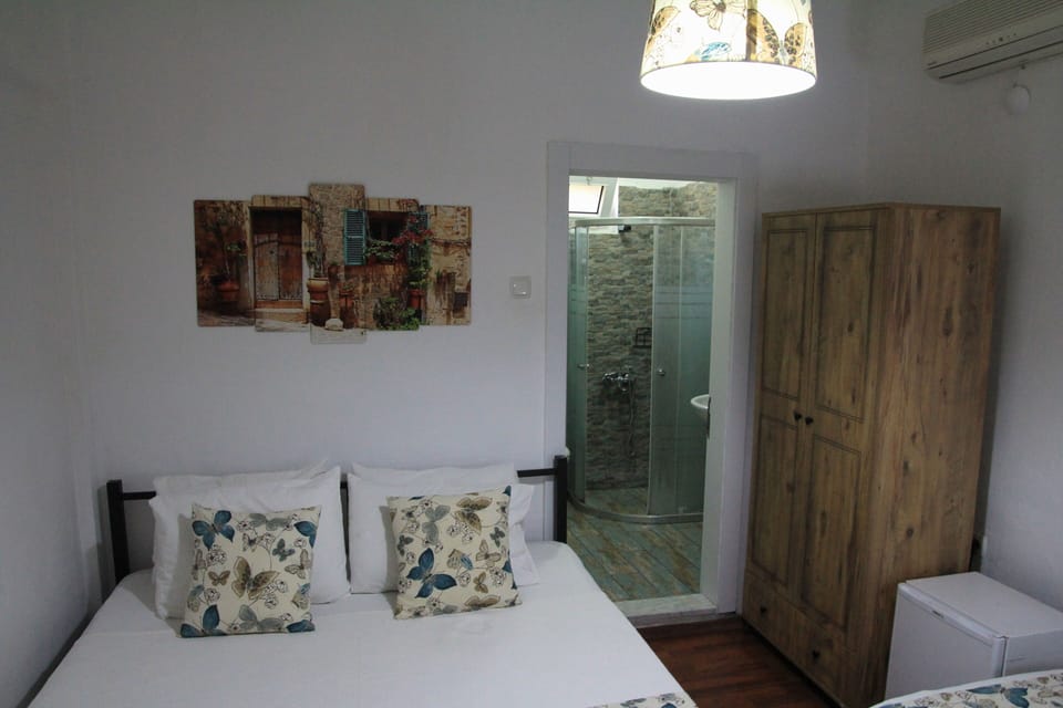 Grand Triple Room | Minibar (some free items), blackout drapes, WiFi (free), bed sheets