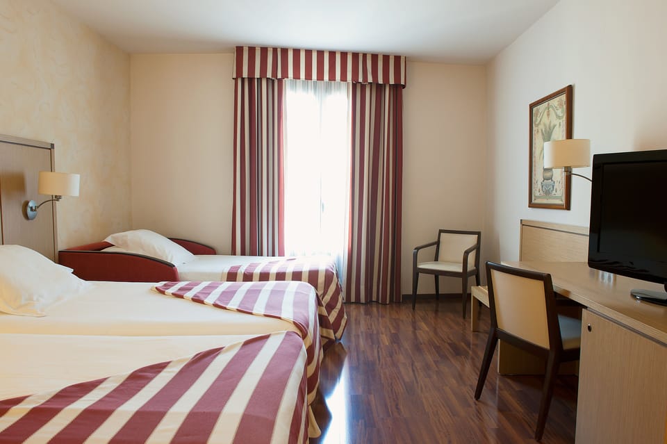 Triple Room | Premium bedding, down comforters, in-room safe, desk