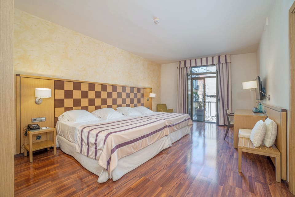 Exclusive Quadruple Room | Premium bedding, down comforters, in-room safe, individually decorated
