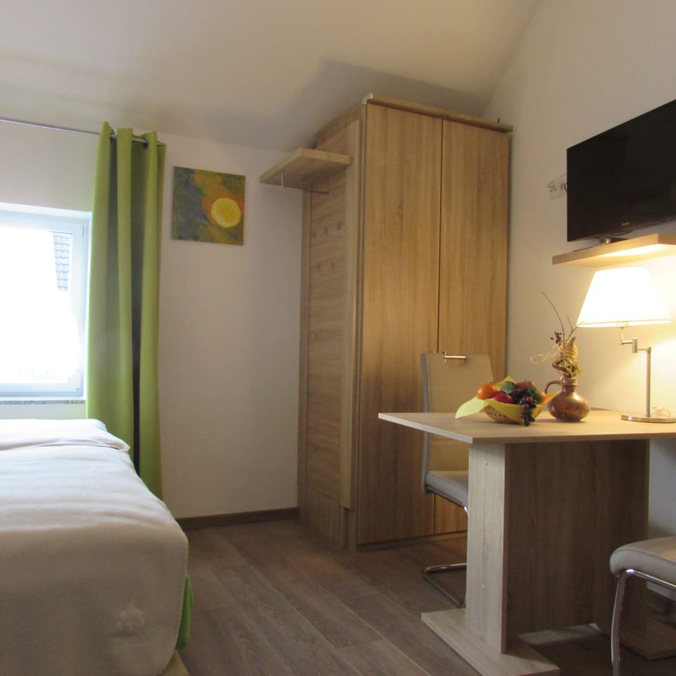 Premium bedding, down comforters, desk, laptop workspace