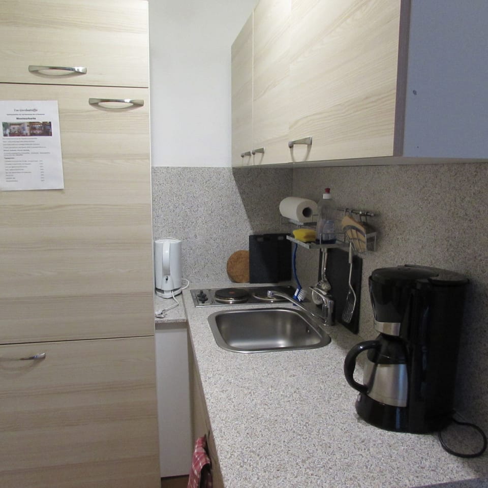 Espresso maker, coffee/tea maker, fridge, electric kettle