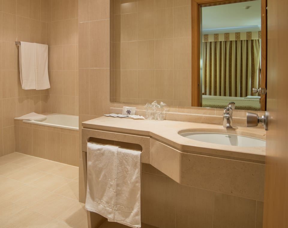 Bathtub, deep soaking tub, free toiletries, hair dryer
