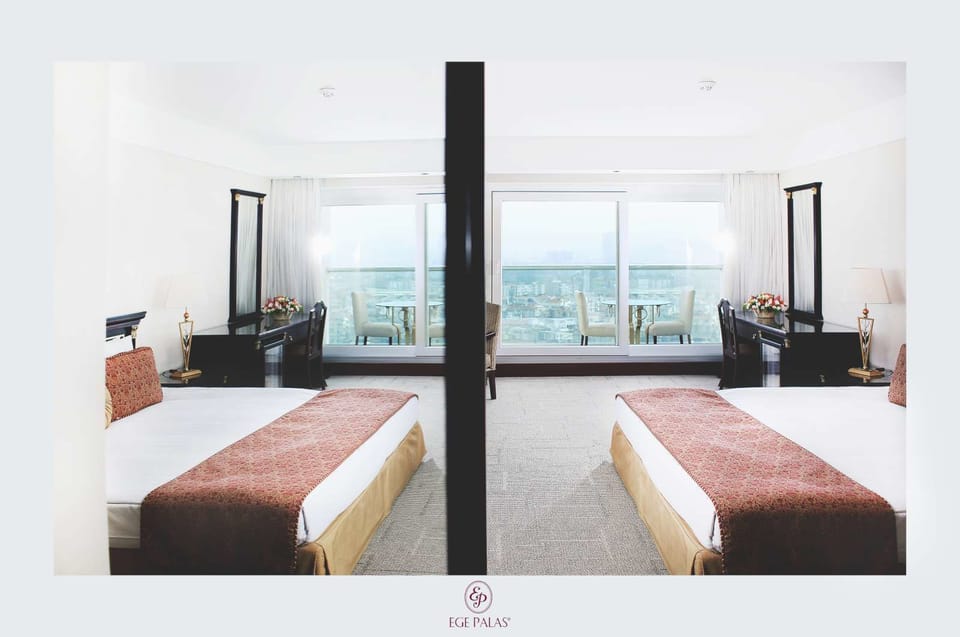 Standard Double Room, Sea View | Minibar, in-room safe, desk, free cribs/infant beds