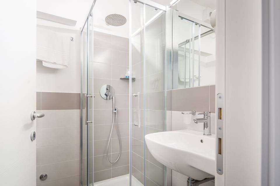 Quadruple Room, Sea View | Bathroom | Shower, free toiletries
